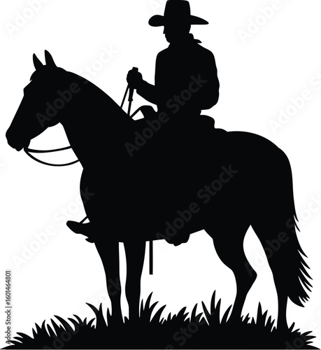 Silhouette of cowboy on horse standing in grass against white background