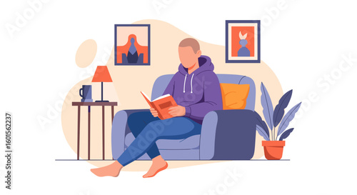 Relaxing man reading a book in a comfy armchair, perfect for wellbeing and home comfort websites and blogs.