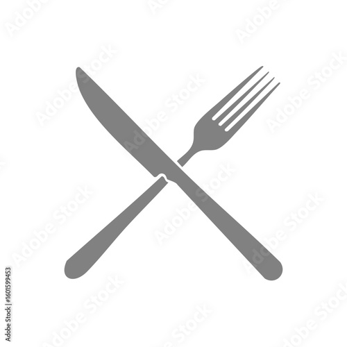 Crossed silverware image with a silver fork and knife symbol for food, restaurant, dinner or lunch.