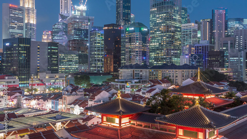 The Buddha Tooth Relic Temple comes alive at night in Singapore Chinatown day...