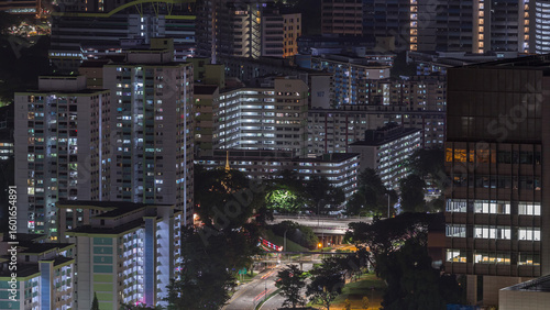 Canvas Print Aerial skyline with apartment buildings and skyscrapers of Singapore night timel