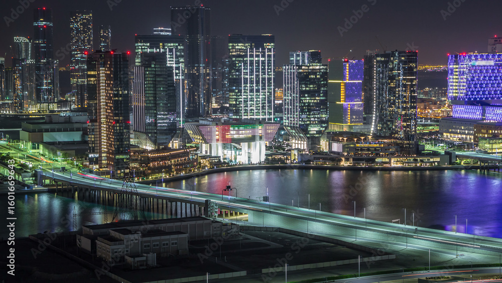 Naklejka premium Aerial skyline of Abu Dhabi city centre from above night timelapse
