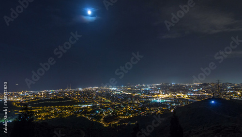 Canvas Print Barcelona and Badalona skyline with roofs of houses and sea on the horizon night