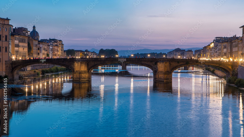 Obraz premium Ponte Santa Trinita Holy Trinity Bridge day to night timelapse over River Arno in Florence