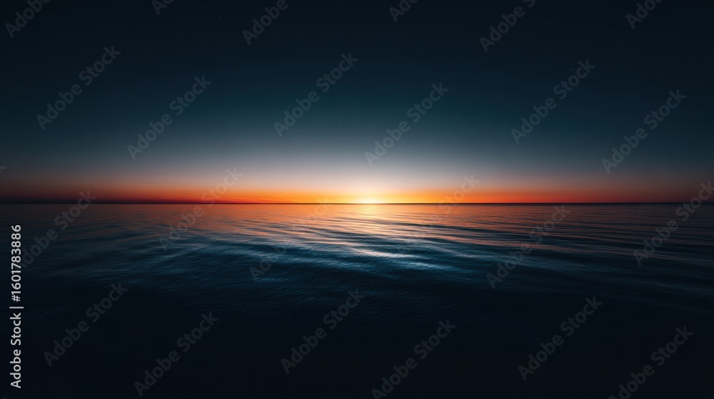 Obraz premium Sunset over calm water