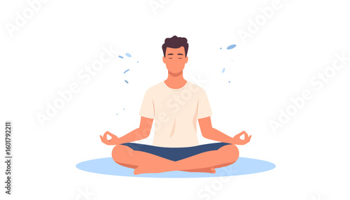 Calm young man with closed eyes meditating in the lotus position, wearing casual clothes.
