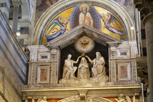 Obraz na plátně View of the St Mary of Assumption sculpture of Jesus, God and the Holly Spirit crowning Virgin Mary and the mosaic of Mary and Jesus between two angles above