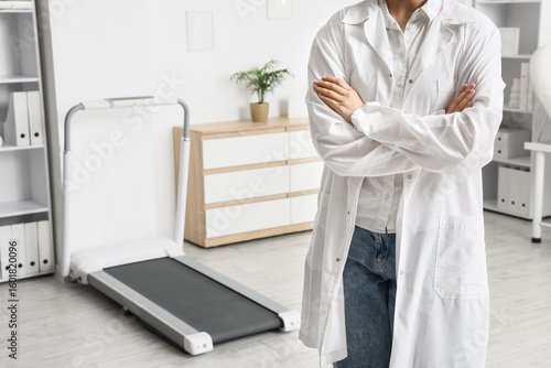 Female physiotherapist near...
