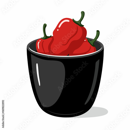 Vibrant Red Habanero Peppers in a Sleek Black Bowl