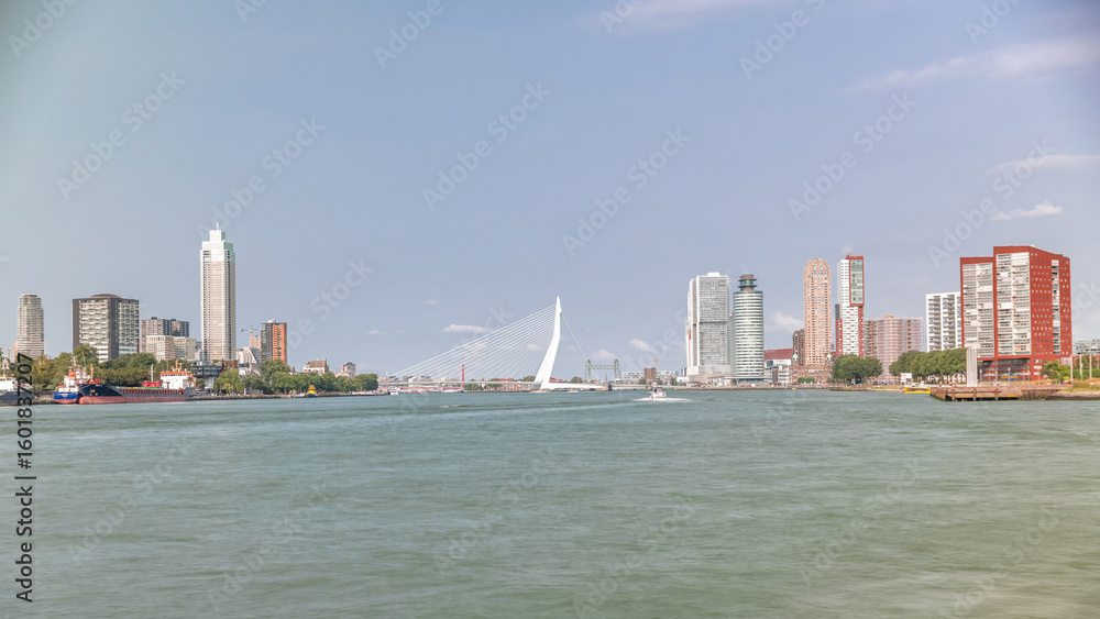 Fototapeta premium Timelapse of Erasmus Bridge, called The Swan, spanning the Maas River in Rotterdam, Netherlands.