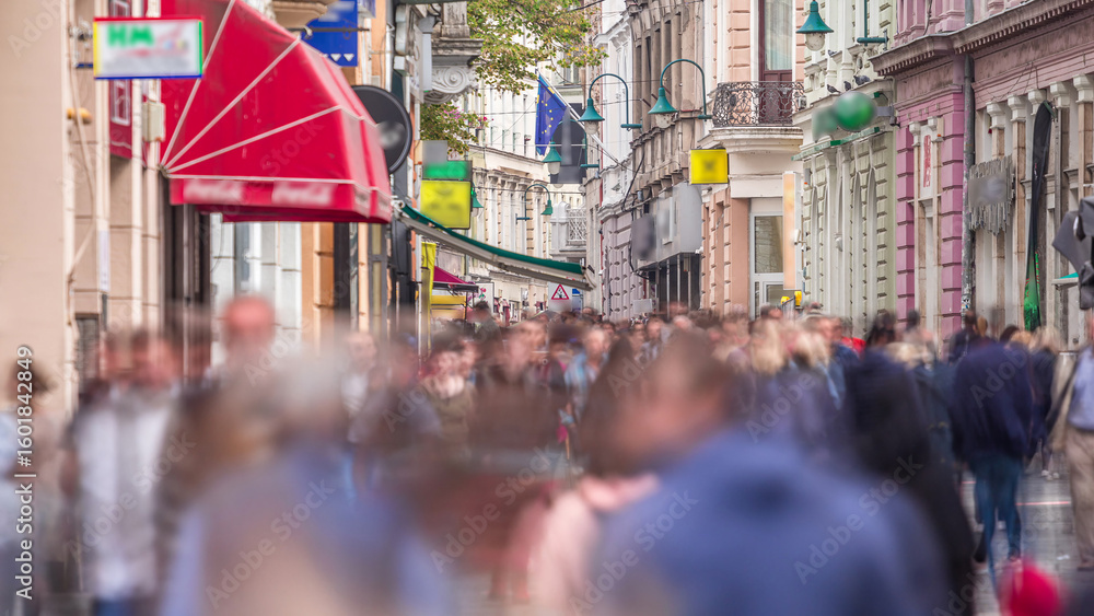Fototapeta premium View on Ferhadija pedestrian street crowded with people timelapse
