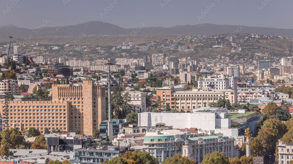 Naklejka premium Aerial view of column of freedom in the center of the city timelapse in Tbilisi. Georgia