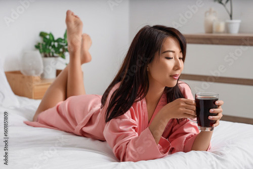 Relaxed asian woman enjoyin...