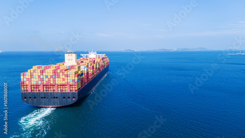 Tableau sur toile Aerial of cargo ship carrying container  for export cargo from cargo yard port t