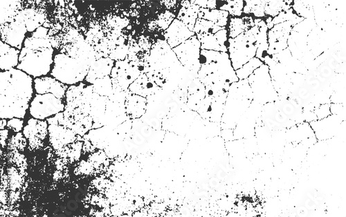 Cracked surface with scattered dark splatters and textured patches grunge distressed