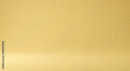 Warm golden yellow abstract studio background with a smooth gradient. Minimalist empty space for product presentation or design.