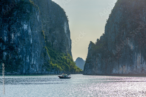 Dreamy sunset landscape Halong Bay, Vietnam view from adove. This is the UNESCO World Heritage Site, a beautiful natural wonder in northern Vietnam.