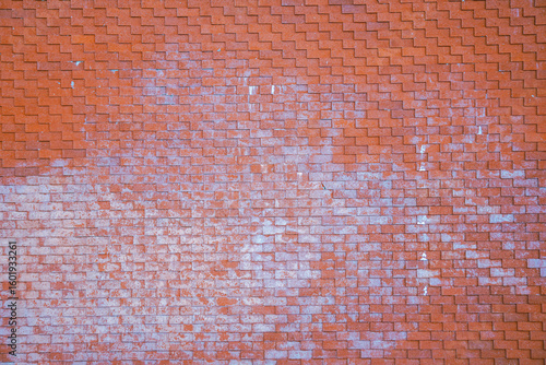 Vászonkép Close-up of a grunge, weathered red brick or tile wall surface with white efflorescence stains