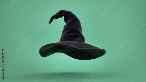 3D icon style classic witch hat with a curled tip, floating upward and spinning slowly, isolated on a green background.