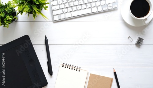 Workspace with digital tools and coffee