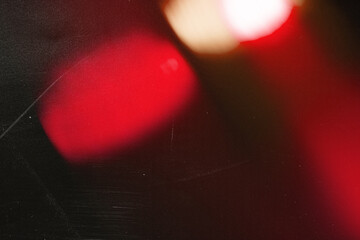 light leak overlay effect with scratch dust and red light leaks,retro noisy film texture light leak flare on black background,grunge texture with light leaks