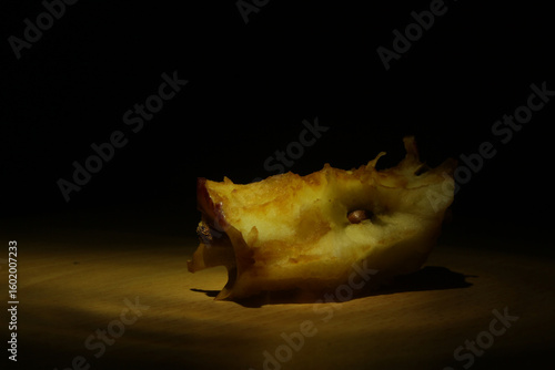 split apple with dramatic light
