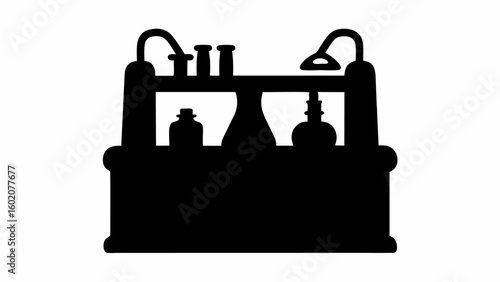 Silhouette of a laboratory setup with flasks, test tubes, and a light on a table, all in black color