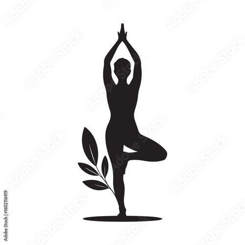 Silhouette of woman in tree pose yoga position