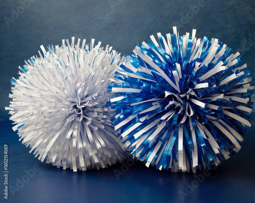 Blue and white pom poms cheerleading sports
