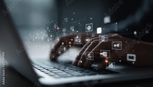 Hands typing on laptop, digital interface overlay