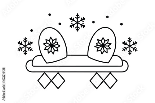 Mittens On Table With Snowflakes