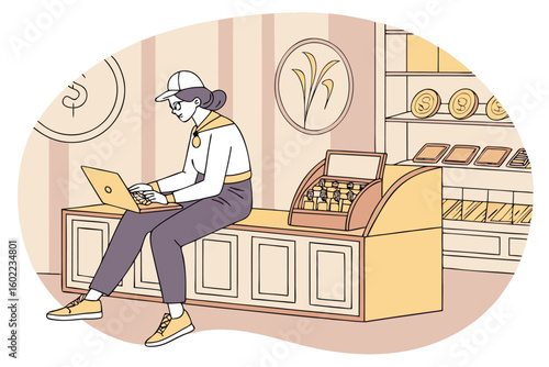 Young woman using laptop in a bright retail store setting while seated at a display counter during daytime