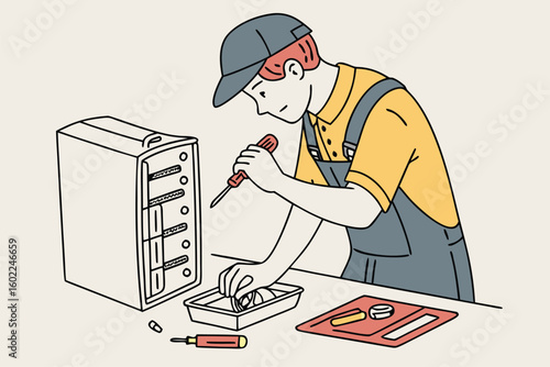 Technician repairing a refrigerator in a workshop at midday with tools and equipment nearby
