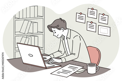 Individual working on laptop in a modern office space during daytime, with documents and books surrounding them for an organized and productive atmosphere