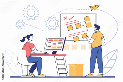 Team members collaborating on project planning with sticky notes and a computer setup in a modern workspace