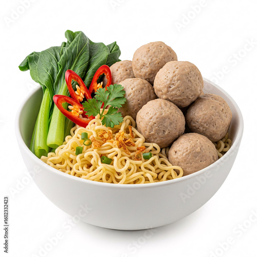 Delicious Bowl of Traditional Indonesian Mie Bakso Meatball Noodle Soup on White Background
