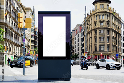 bus shelter with blank ad panel. billboard display. empty white lightbox sign at old street corner. billboard mockup. glass structure.. urban street traffic setting with red bus. outdoor advertising