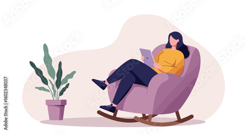 Woman relaxing in a rocking chair while using a tablet indoors  