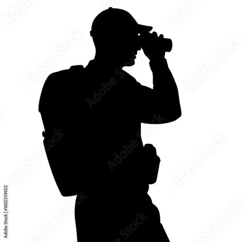 Silhouette of hiker scanning terrain with binoculars – outdoor adventure exploration