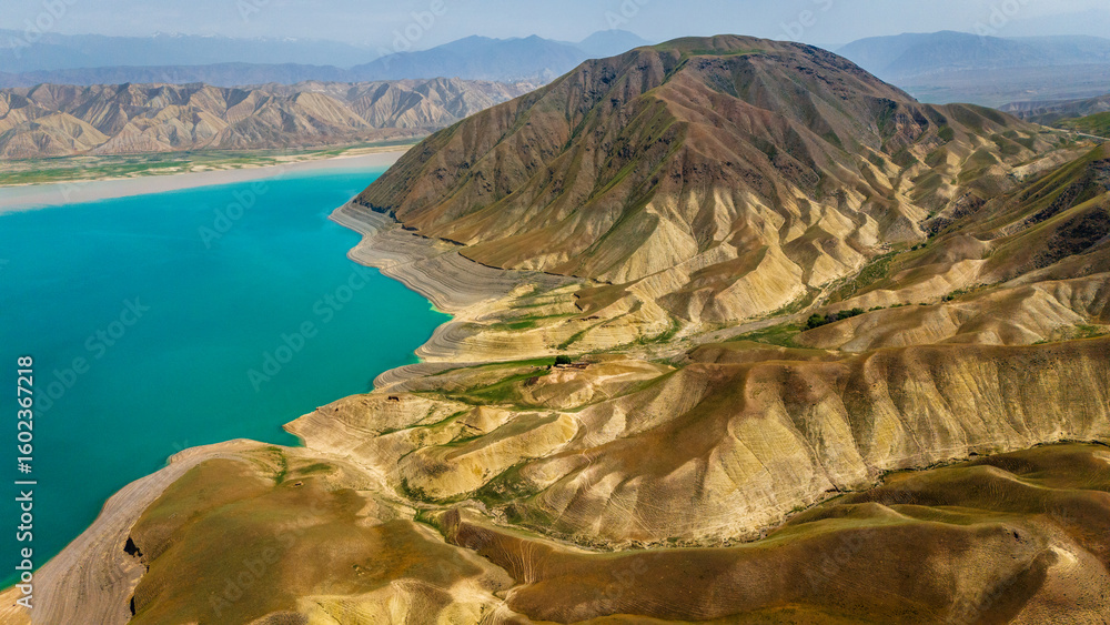 Fototapeta premium Kyrgyzstan Toktogul lake largest water reservoir in Kyrgyz Republic and Central Asia, travel destination