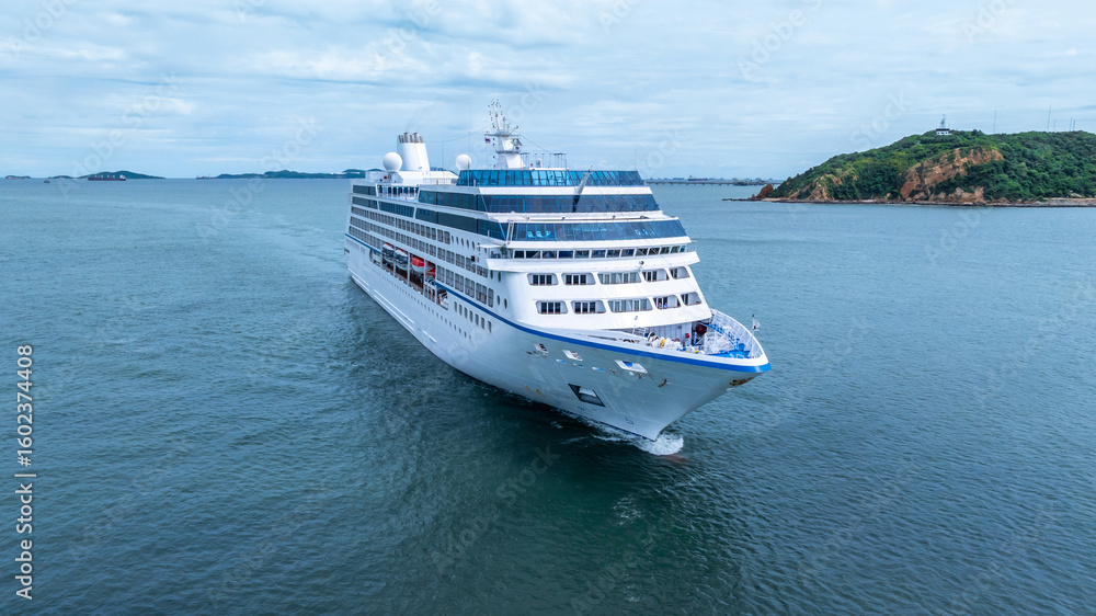 Naklejka premium Aerial view cruise ship liner on ocean sea, Luxury cruise ship liner modern maritime travel lifestyle ocean sea, Cruise ship liner exclusive tourism travel on holiday take vacation time.