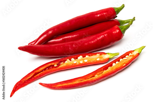 Photos Sliced pods of red natural organic chili pepper on white background