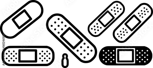 Black and white vector illustration of medical bandages and band aids