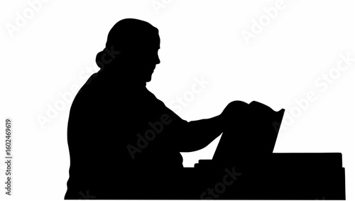 Silhouette of a person playing the piano with sheet music on the music stand in a white background scene