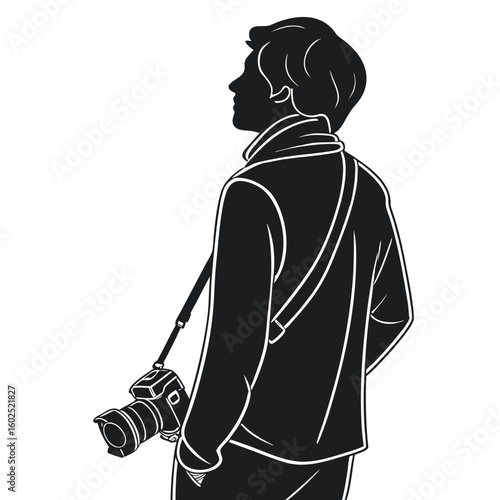 Silhouette of Male Photographer Standing with Camera Hanging from Neck  
