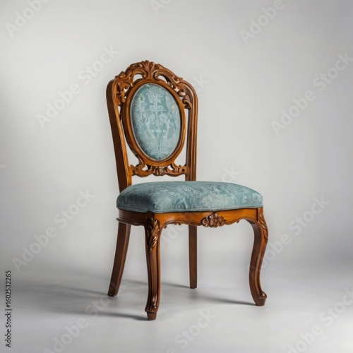 Wallpaper Mural Photo of an antique carved wood chair with blue upholstered seat Torontodigital.ca