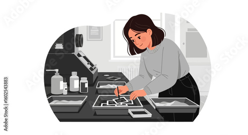 Woman diligently processing photos in a darkroom creating tangible memories and artistic expression through analog photography techniques bringing
