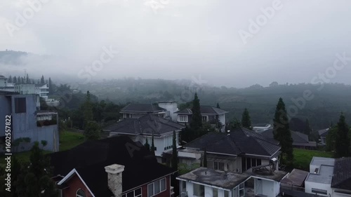 Wallpaper Mural Foggy Morning Over Hills and Residential Buildings Torontodigital.ca