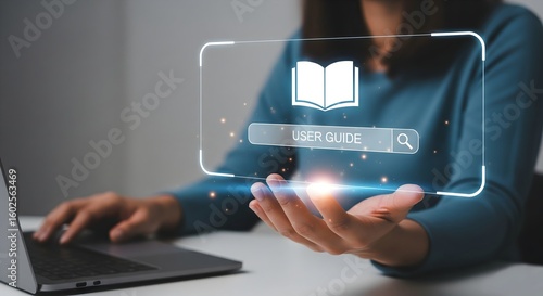 Wallpaper Mural A close-up of hands showing the convenience of digital user manuals and online support, highlighted by a glowing virtual screen displaying a search query for a user guide. Torontodigital.ca