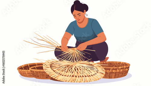 Focused artisan woman with dark hair skillfully weaving a traditional wicker basket from natural fibers.